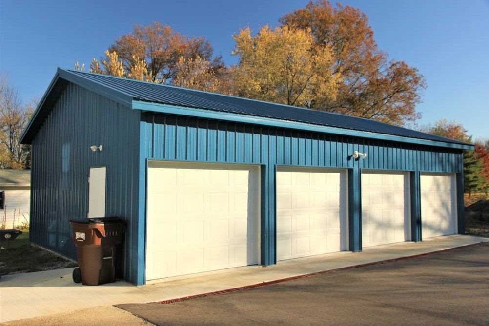 blue and white four car garage pole barn kit in Londonderry OH