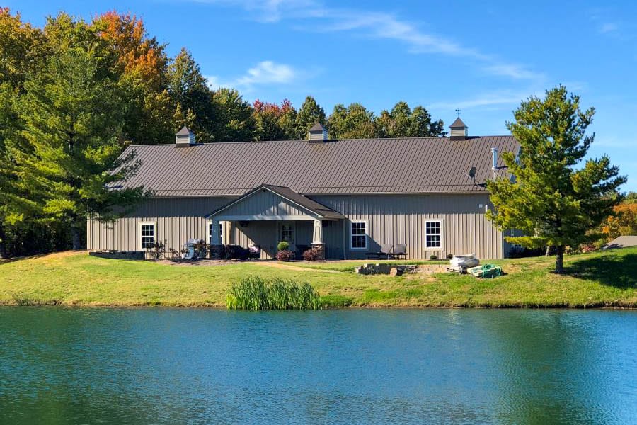 A 20x40 barndominium standing by a lake