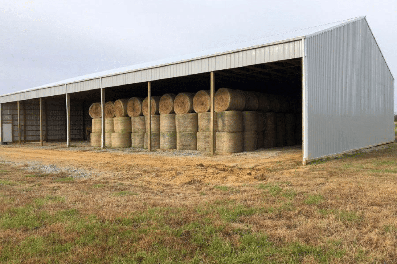 80x120 run in equestrian pole barn kit with hay inside