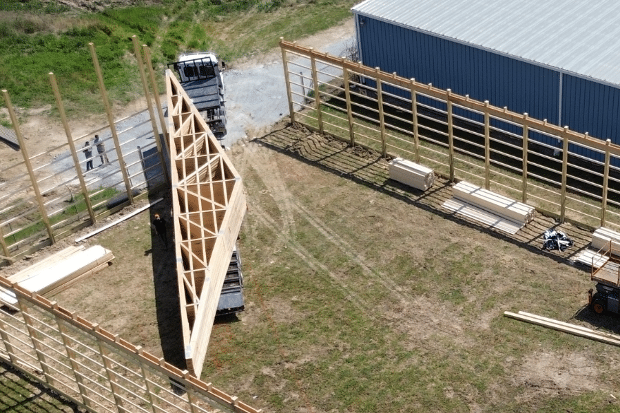aerial view of roof trusses being delivered to job site