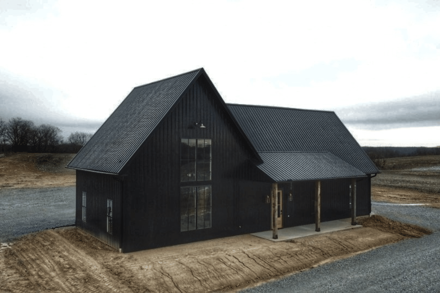 black 100x100 barndominium kit with porch