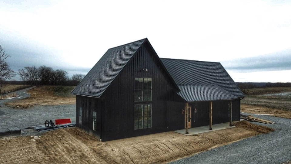black 25x25 barndominium with tall windows