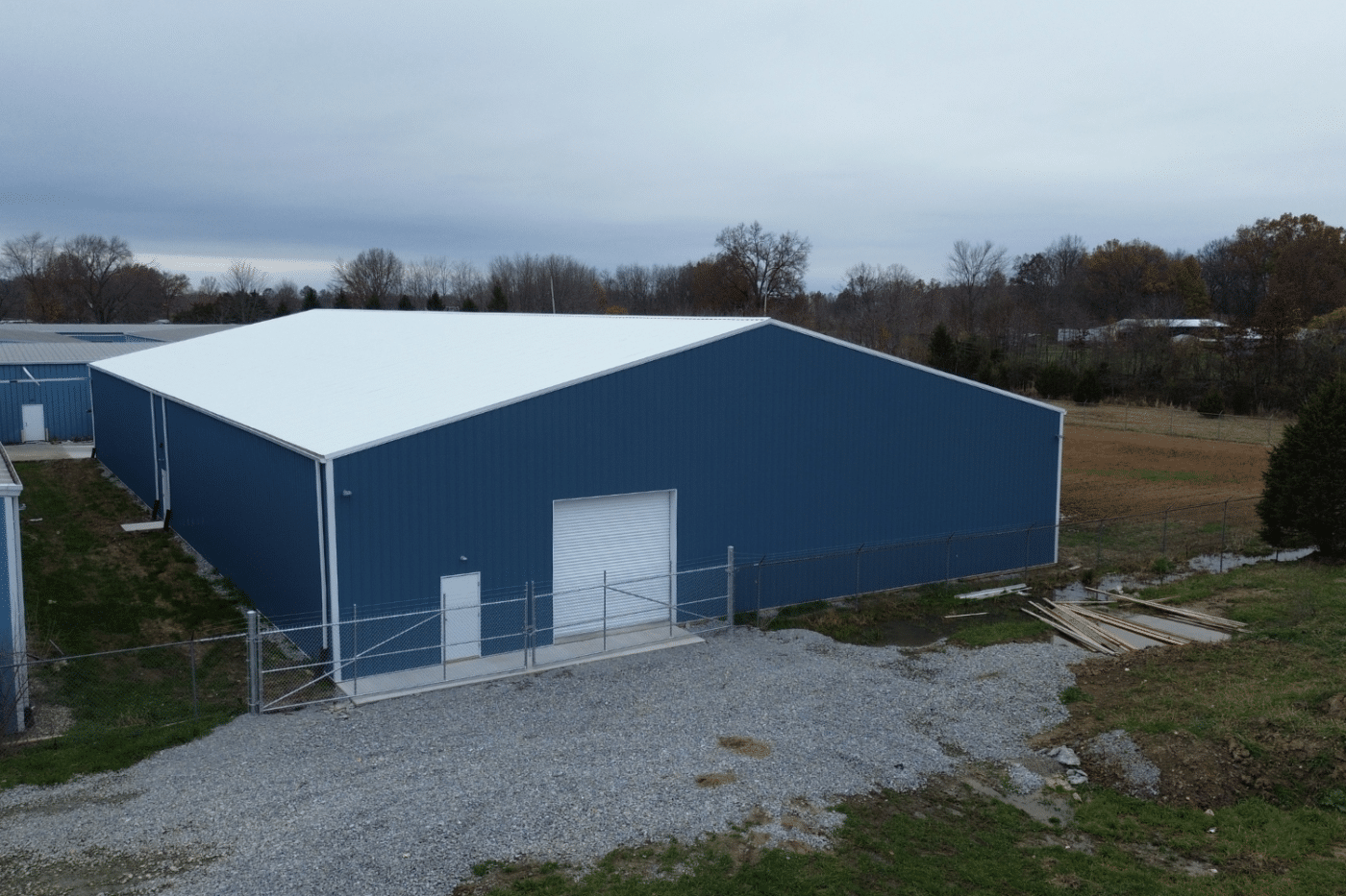 blue garage pole barn kit with white garage in felicity oh