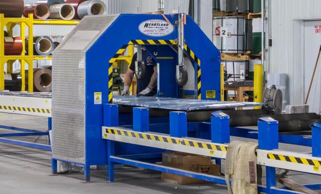 blue metal panels being manufactured