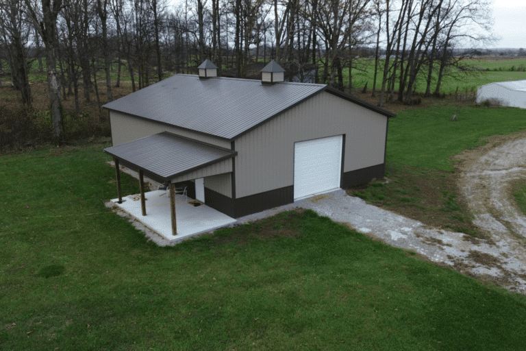 brown and cream 50x70 garage pole barn kit with lean to porch and white garage