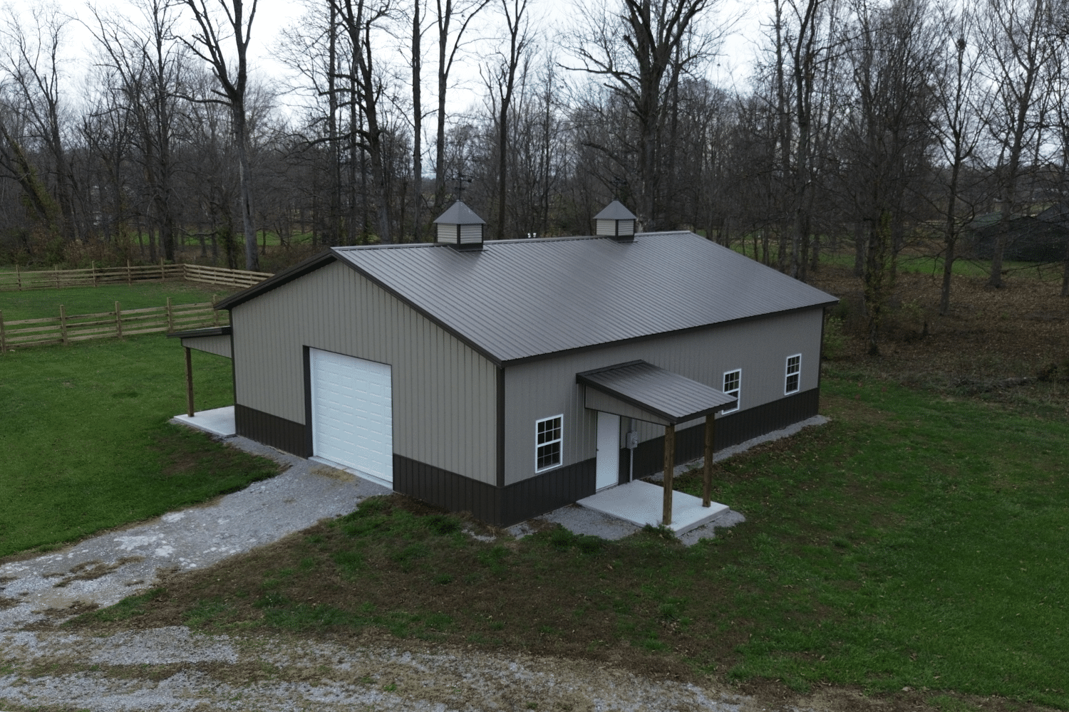 beige and browbn 60x70 garage pole barn kit with white garage