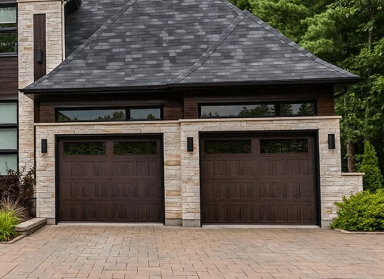 dark brown stamped shaker garage doors with two small black windows