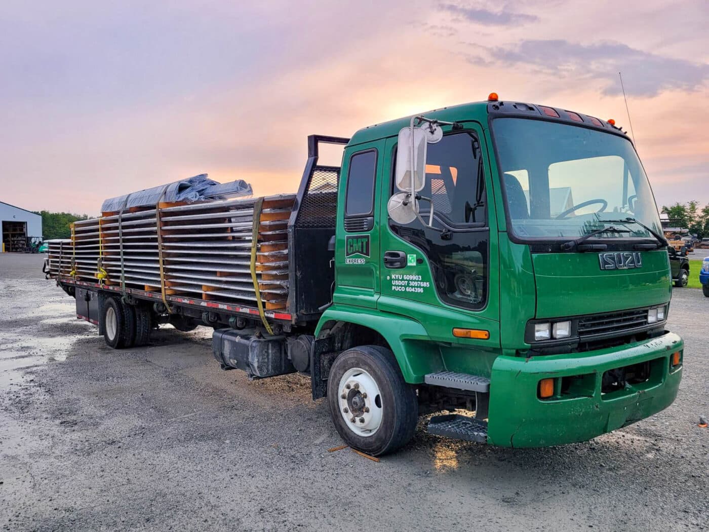 Delivery truck with supplies needed to build 80x120 barndominiums