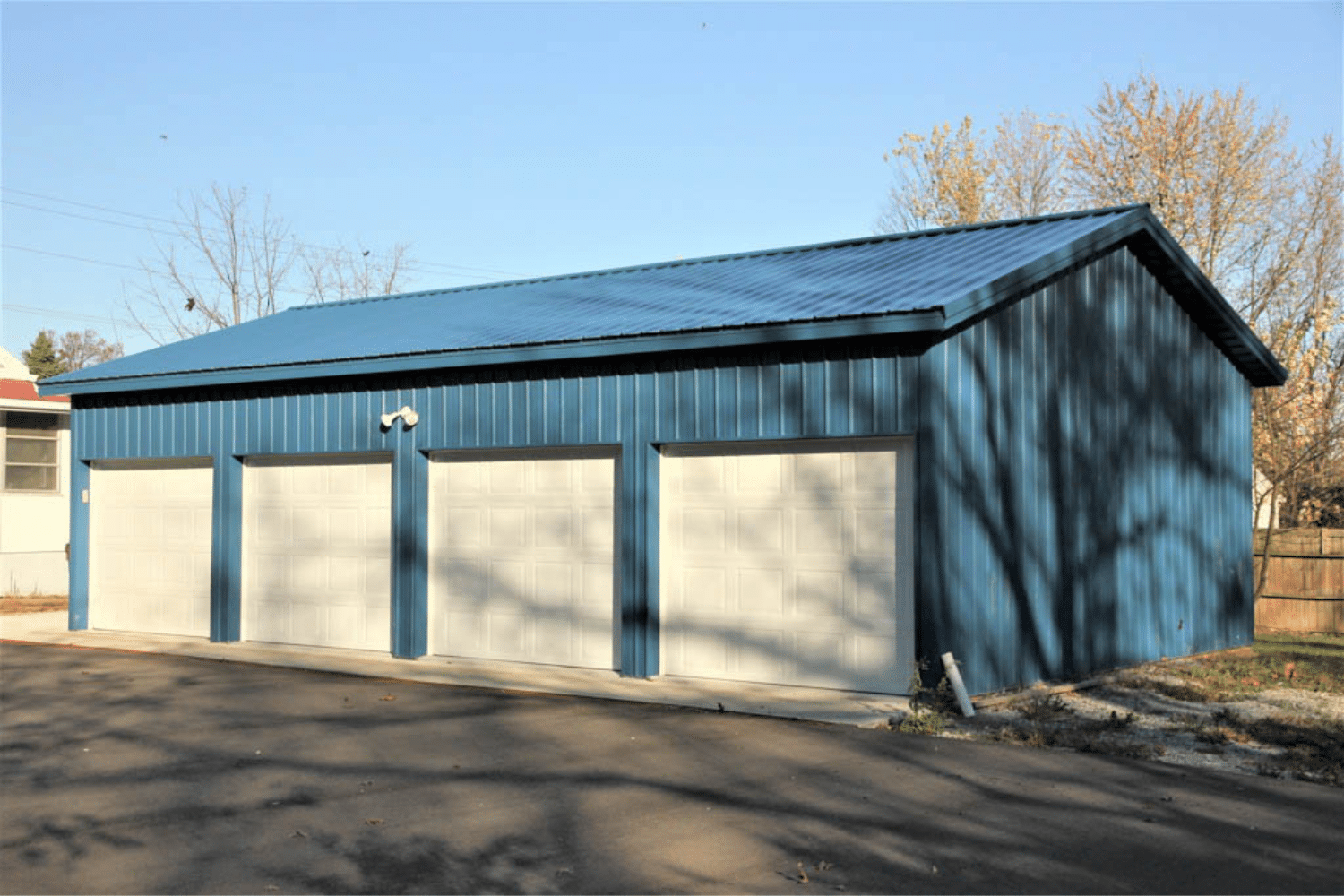 blue and white four car garage pole barn kit in miamisburg ohio