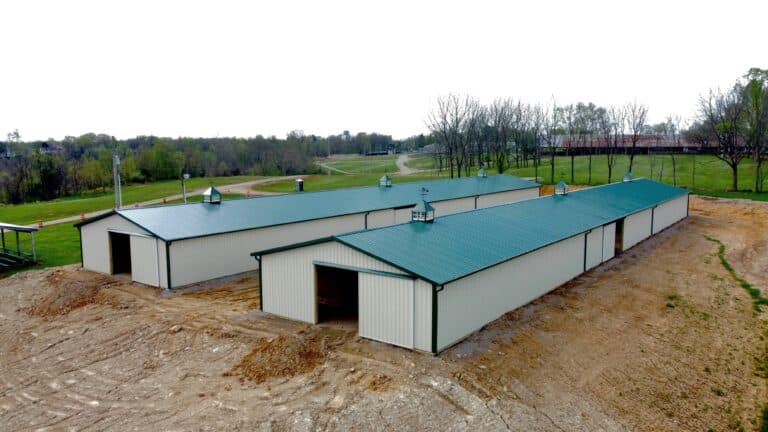 front view of two 36x48 equestrian pole barns