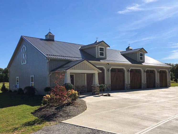 gray 30x60 pole barn garage with 5 brown garage doors
