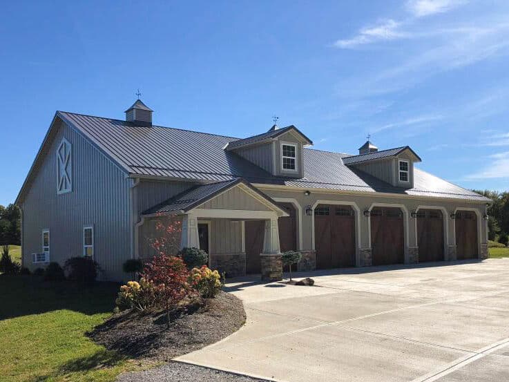 gray 30x60 pole barn garage with 5 brown garage doors