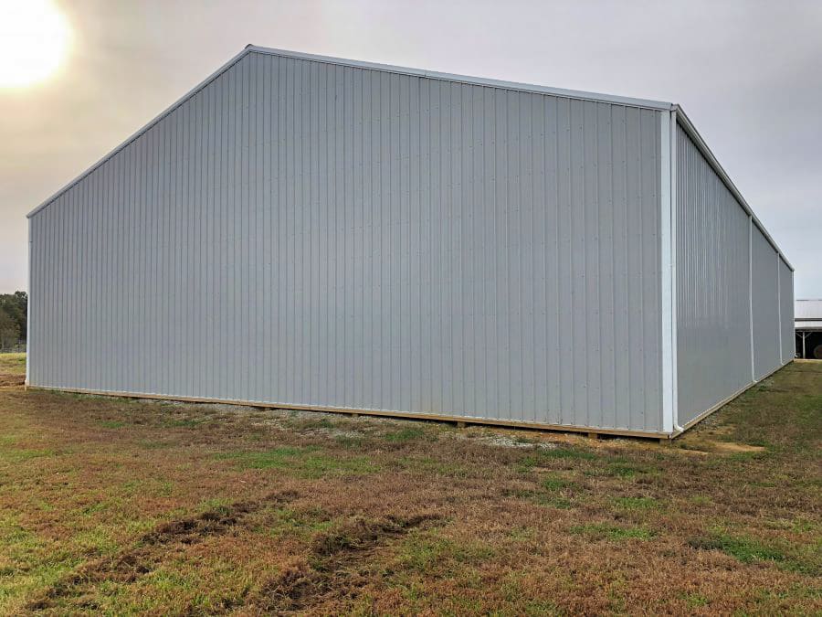 gray metal panels on pole barn