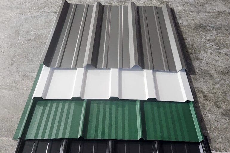 gray white and green metal panels