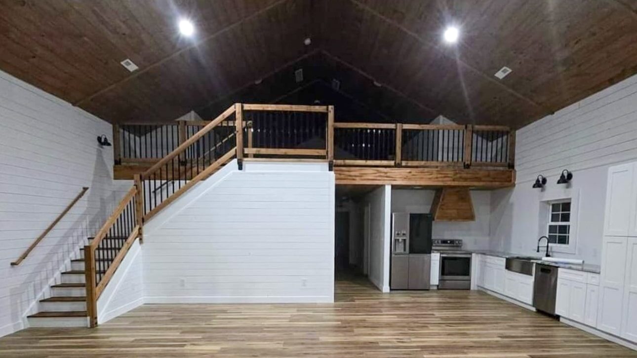 interior of barndominium with multiple rooms and floors