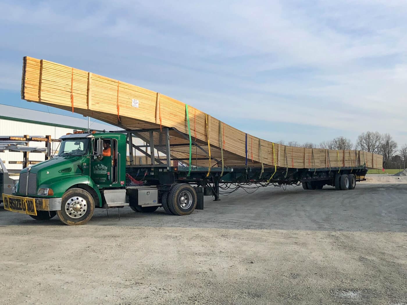 Delivery truck with supplies needed to build 25x25 barndominiums