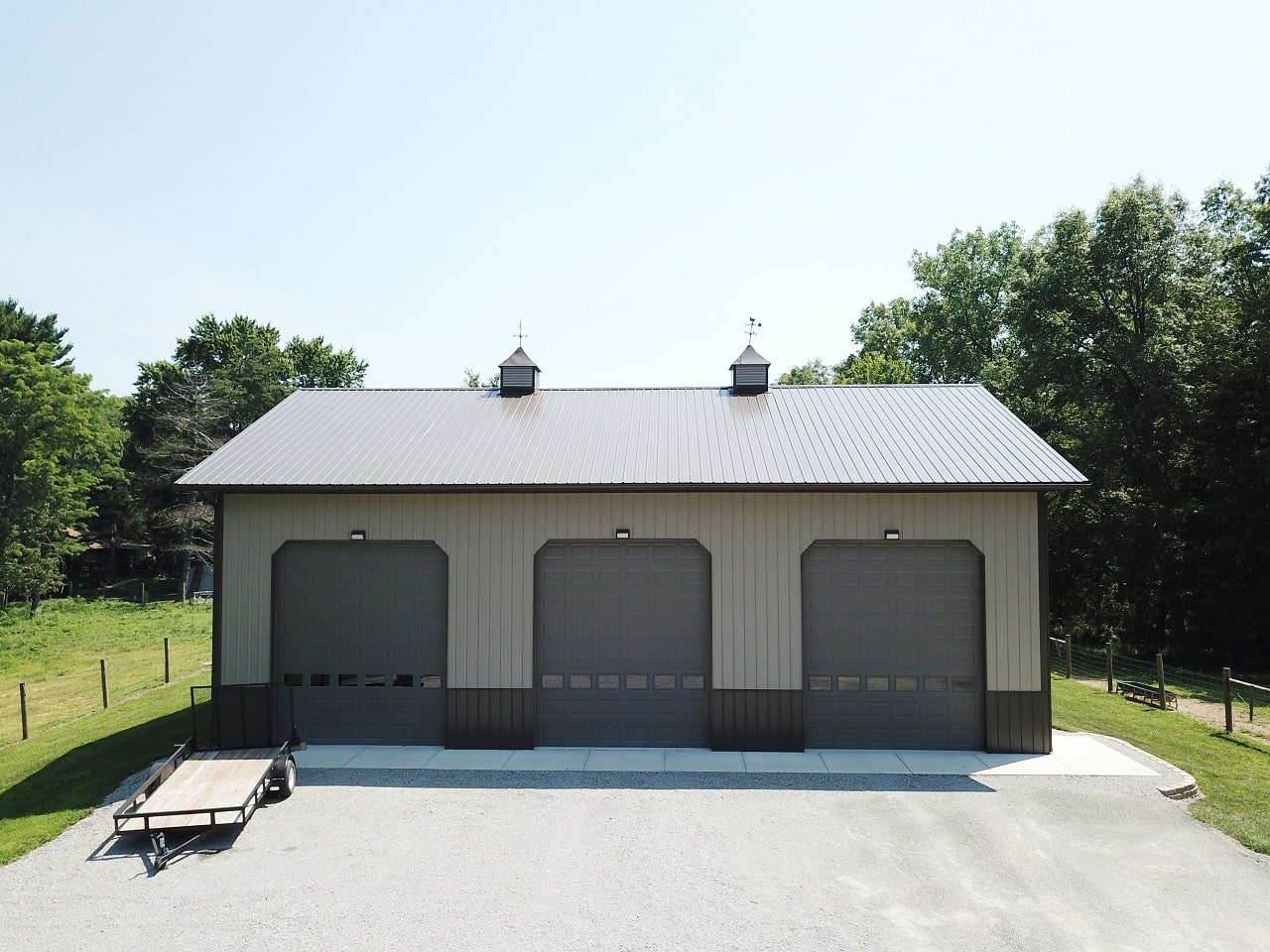 three car garage grey pole barn kit in Richmond IN