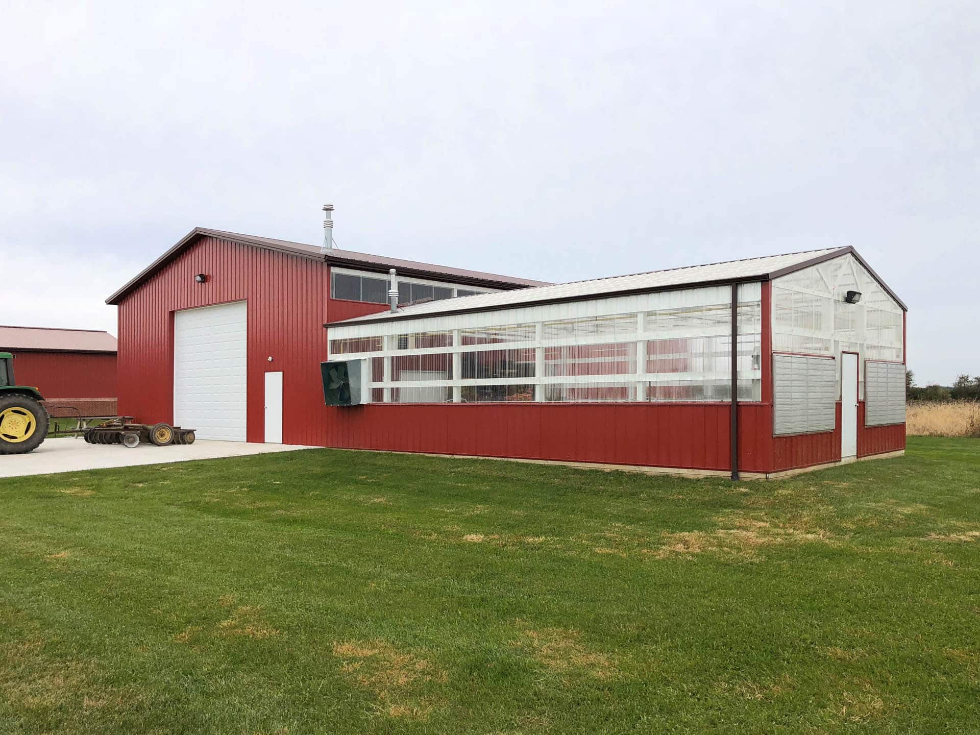 red and clear sided 40x50 agricultural pole barn