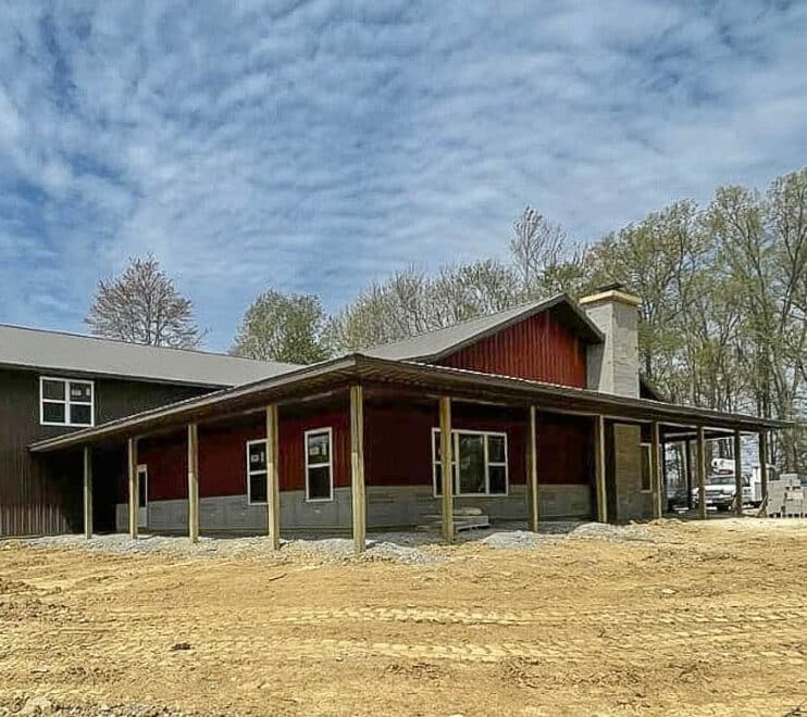 red and gray commercial pole barn