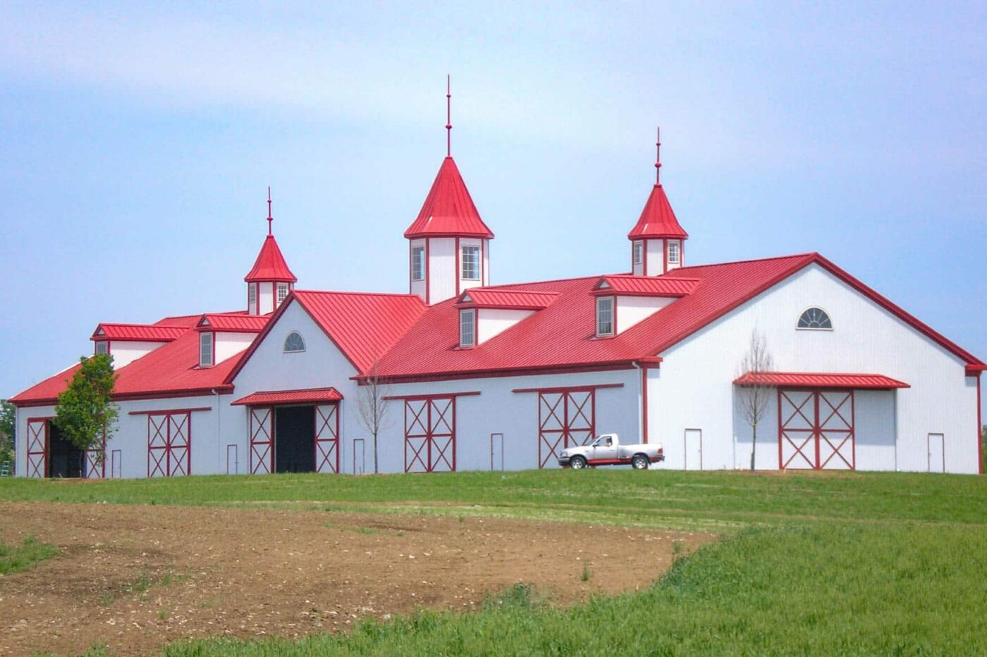 red and white 24x24 equestrian structure in ohio