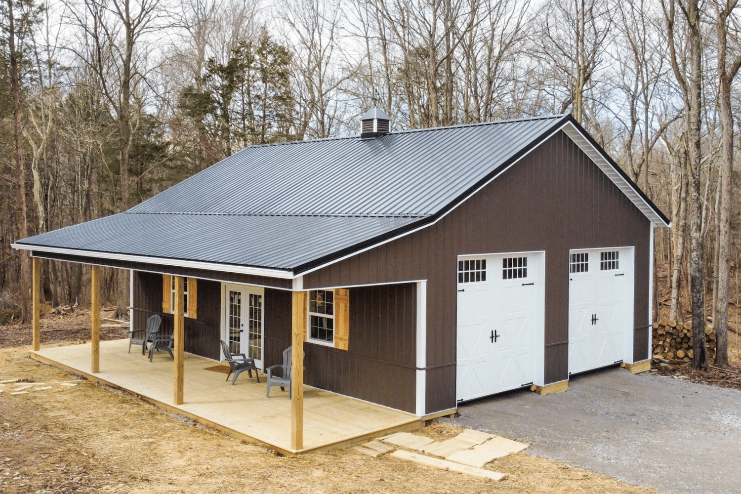 brown residential pole barn kit with two garages and pavilion in miamisburg oh