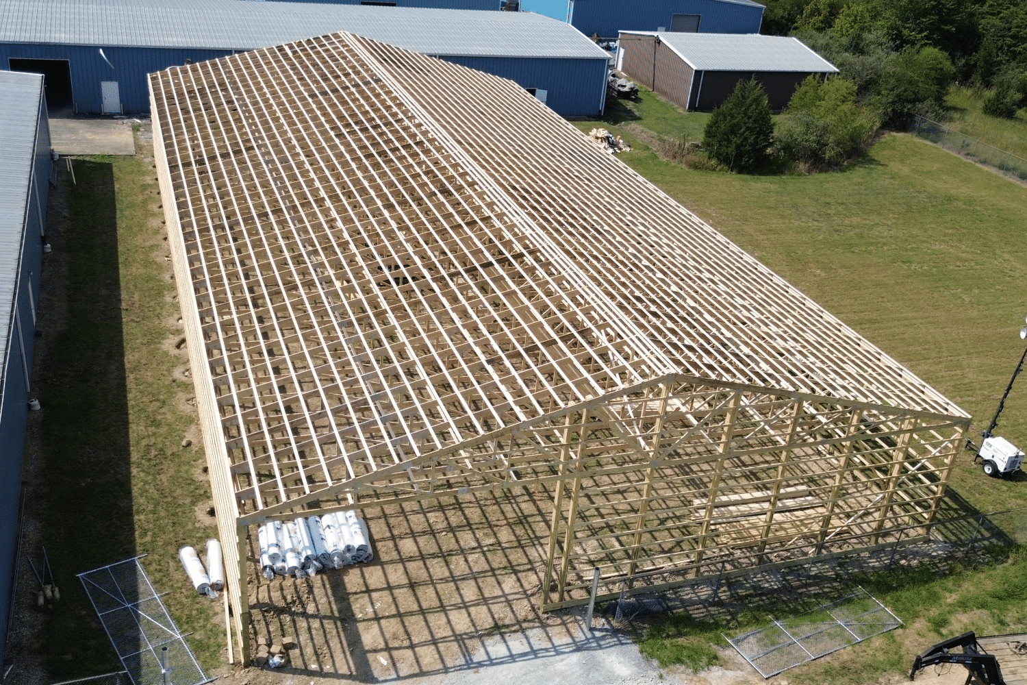 roof trusses being constructed for pole barn kit in sabina ohio