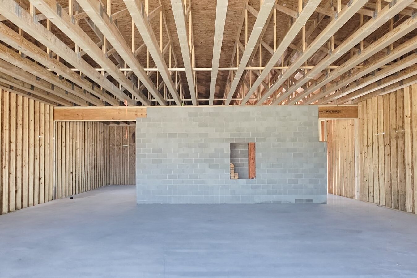 roof trusses on pole barn with concrete foundation