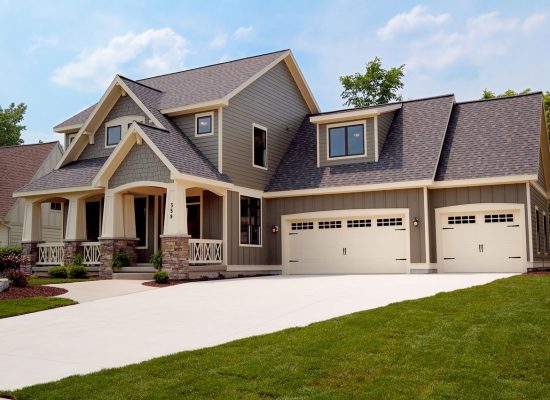 a stamped carriage house with 2 garage doors in middletown oh