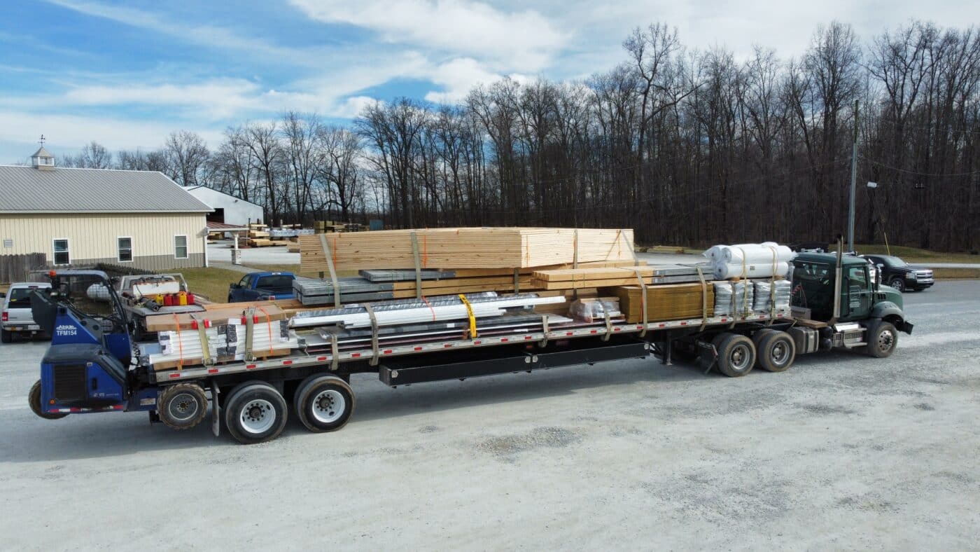 truck carrying materials for 30x72 commercial pole barn kit