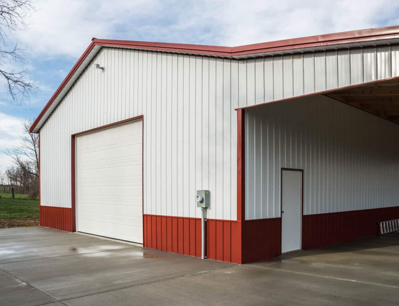 white and red trimmed 40x50 agricultural pole barn