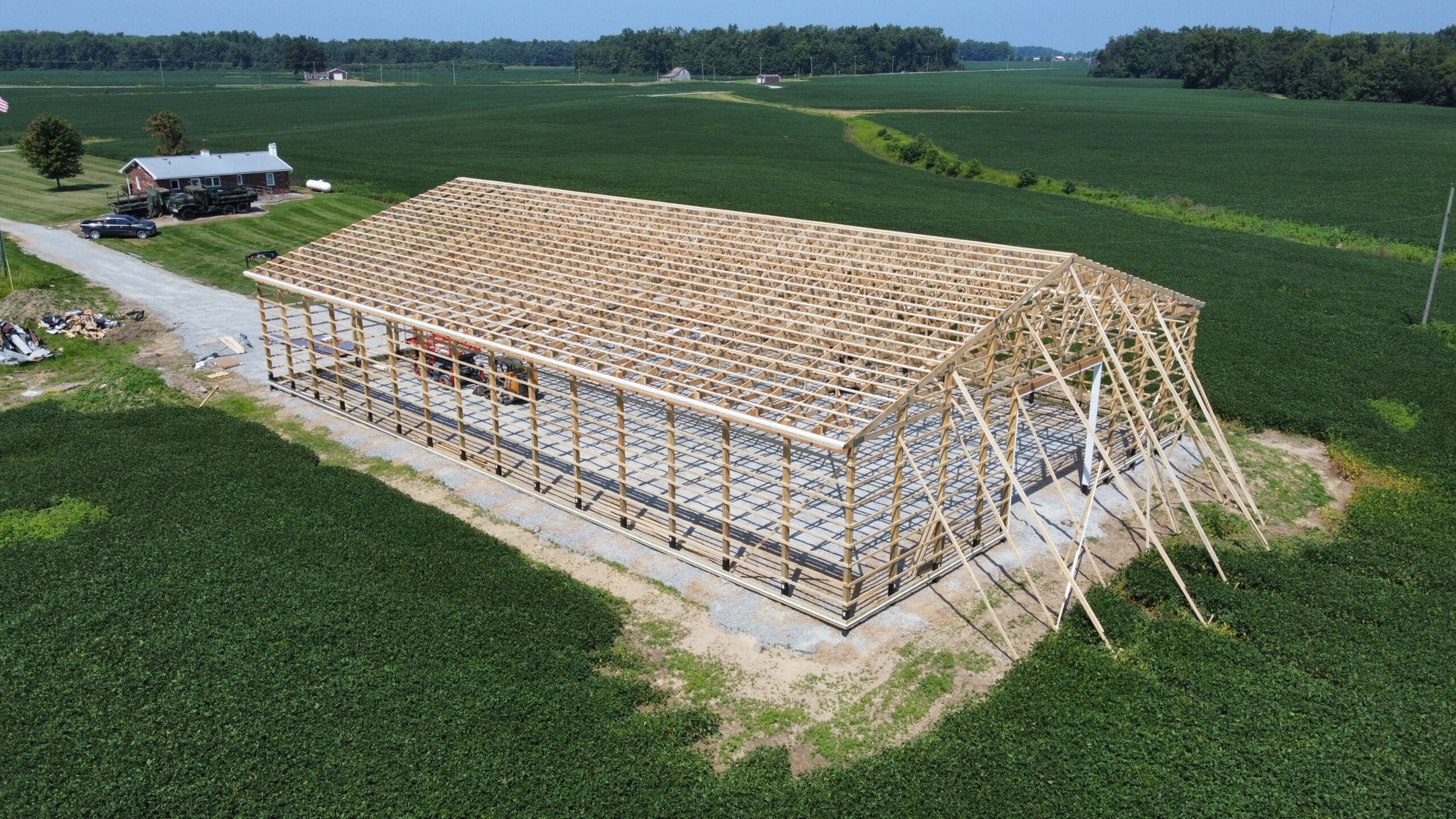 roof trusses on wooden frame of pole barn kit in New Richmond OH