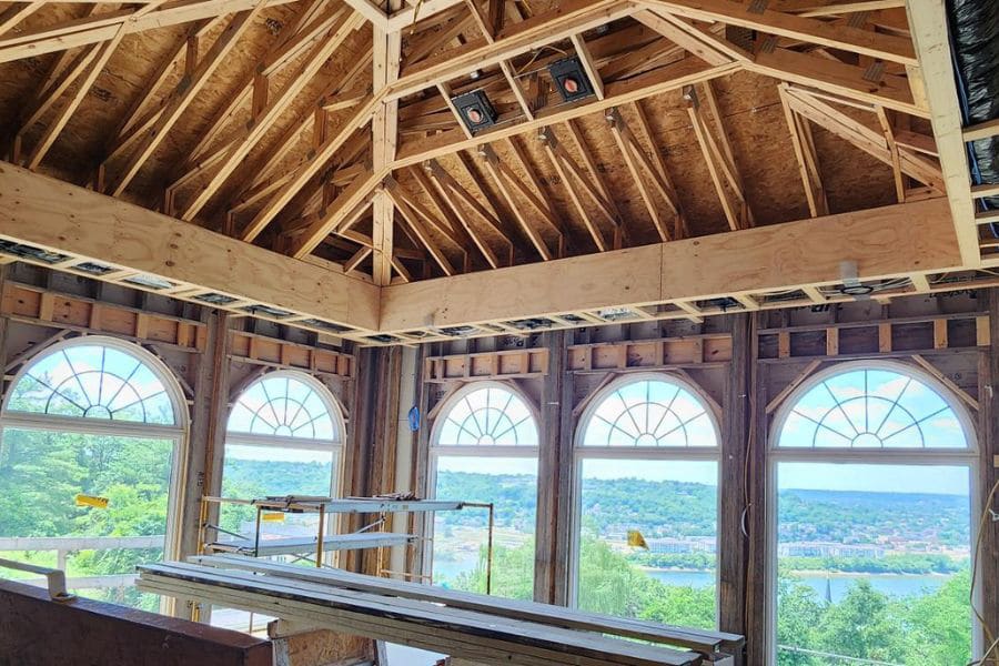 roof trusses and five windows overlooking the Ohio river