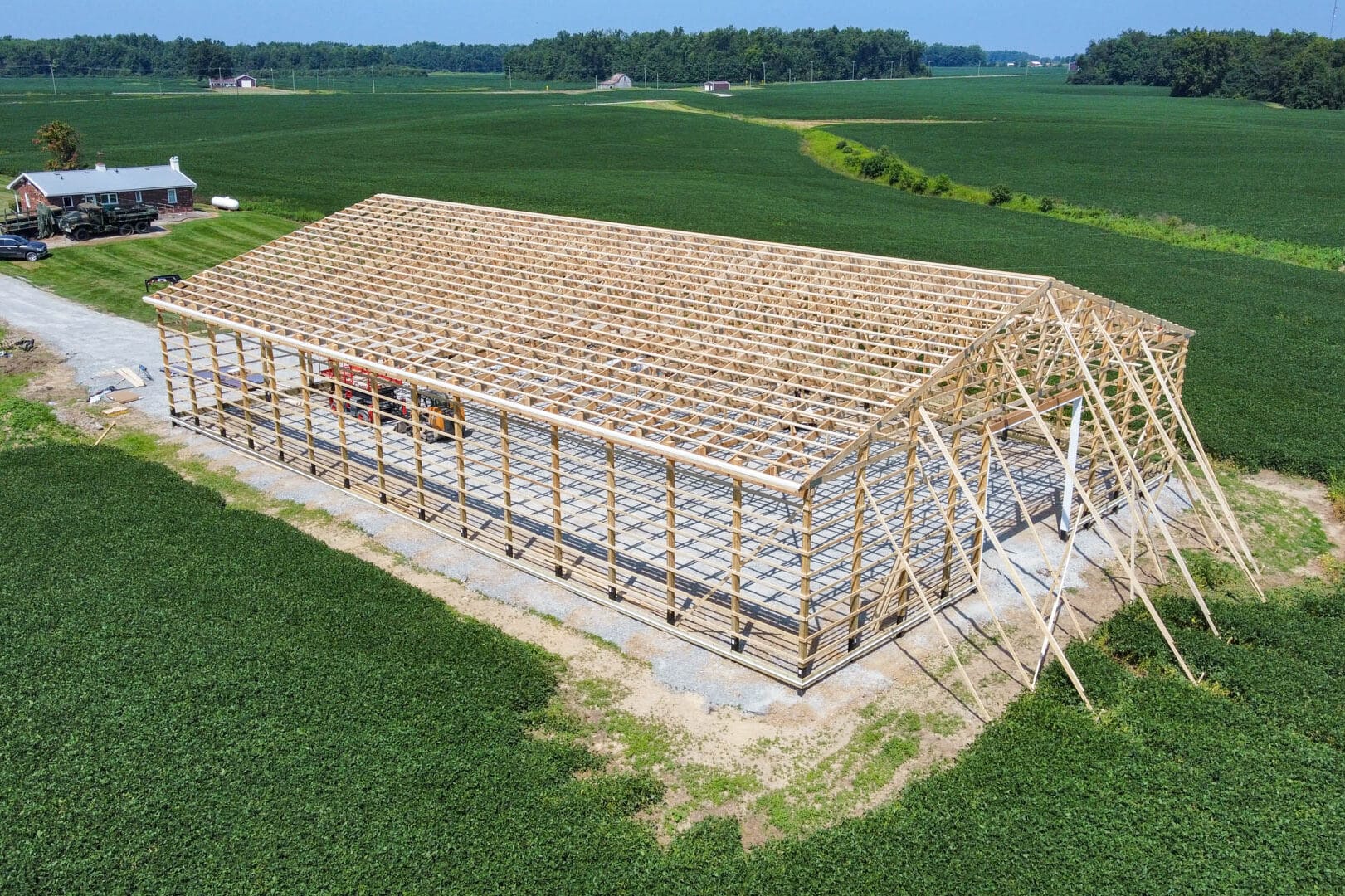 wooden roof trusses on wood frame of a 40x50 agricultural pole barn